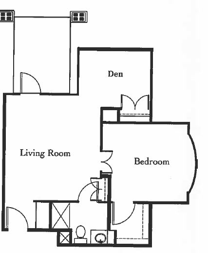 Floor plan of a residential space showing the living room, bedroom, and den.
