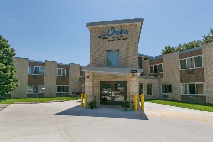 The entrance of Omaha Medical Center on a sunny day.
