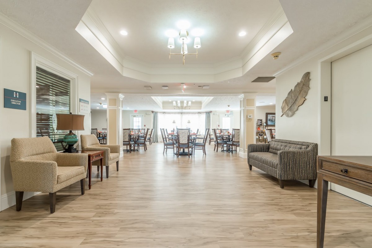 A modern lobby with comfortable seating and elegant lighting fixtures.