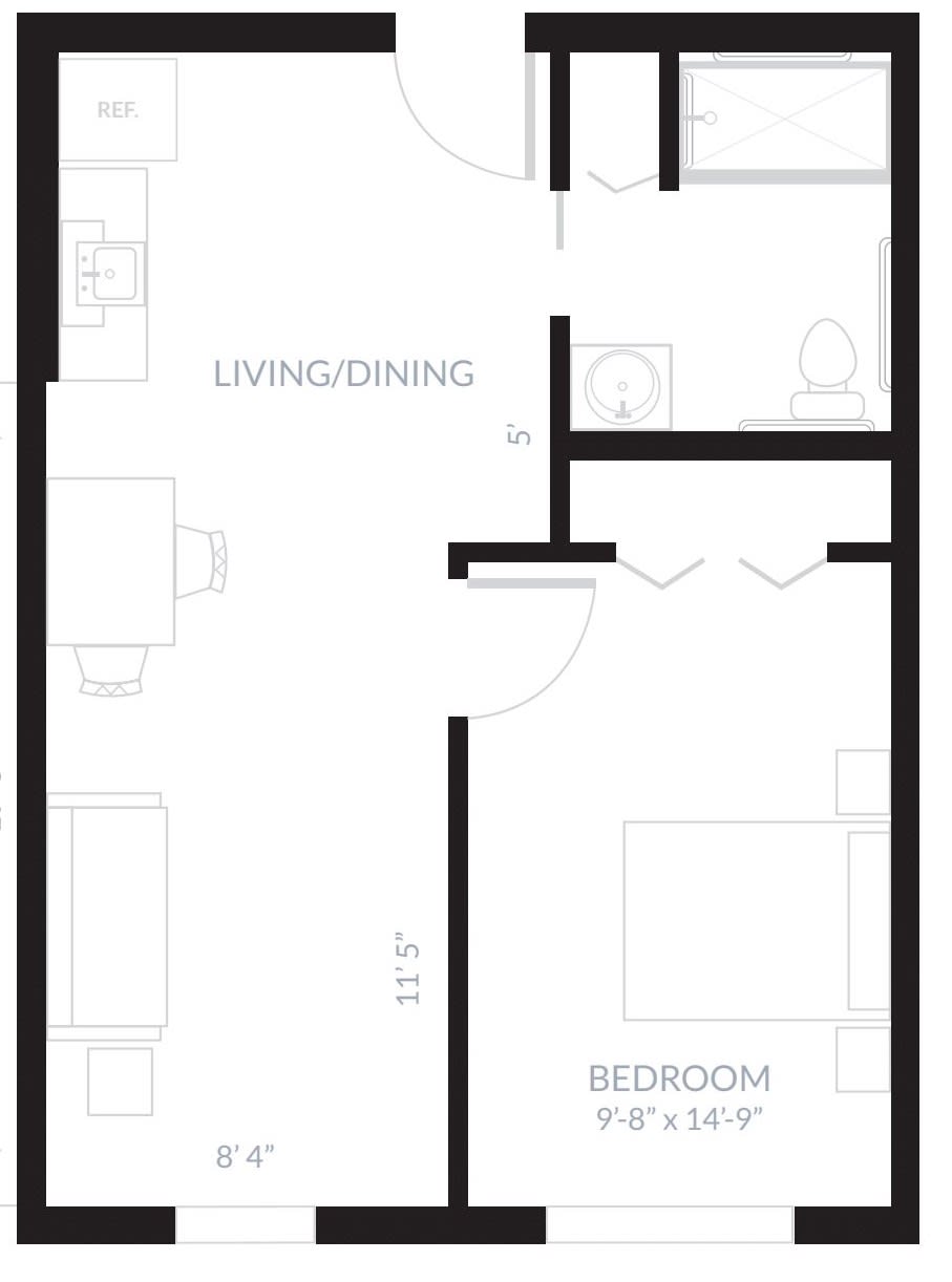 A simple floor plan of an apartment showing a living/dining area, bedroom, and bathroom.