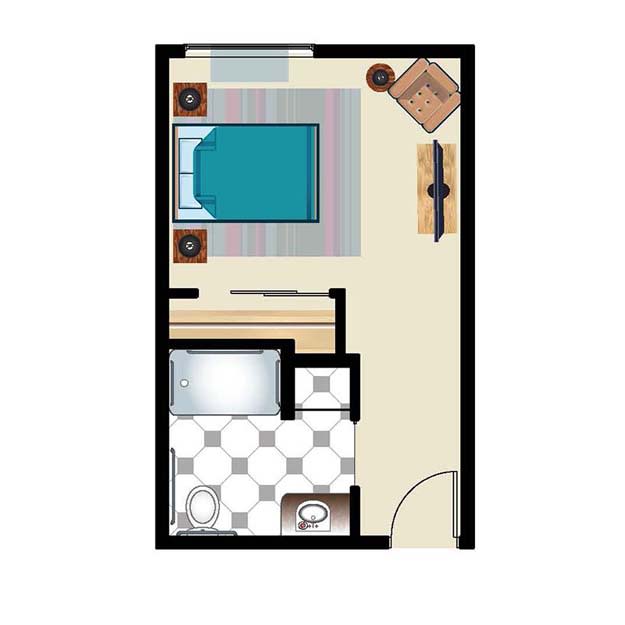 A compact bedroom floor plan showcasing a bed, desk, and bathroom.