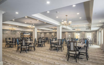 Spacious dining area with elegant decor and ample seating.