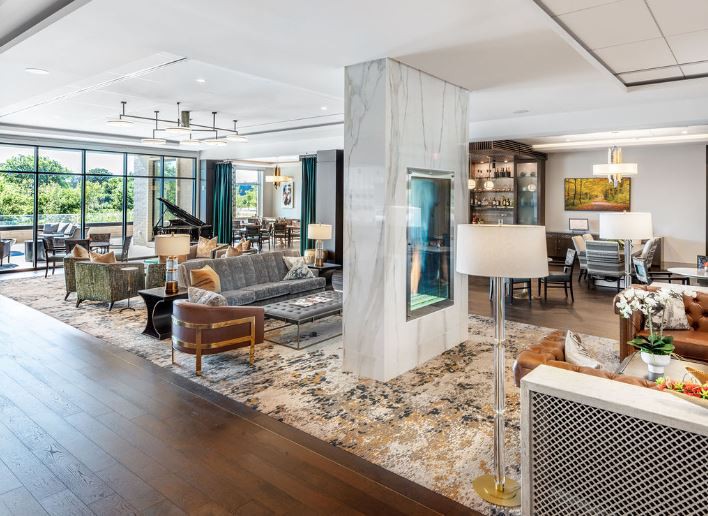 A luxurious, modern living room with elegant decor and open space.
