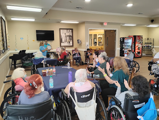 Residents engaging in a community activity at a nursing home.