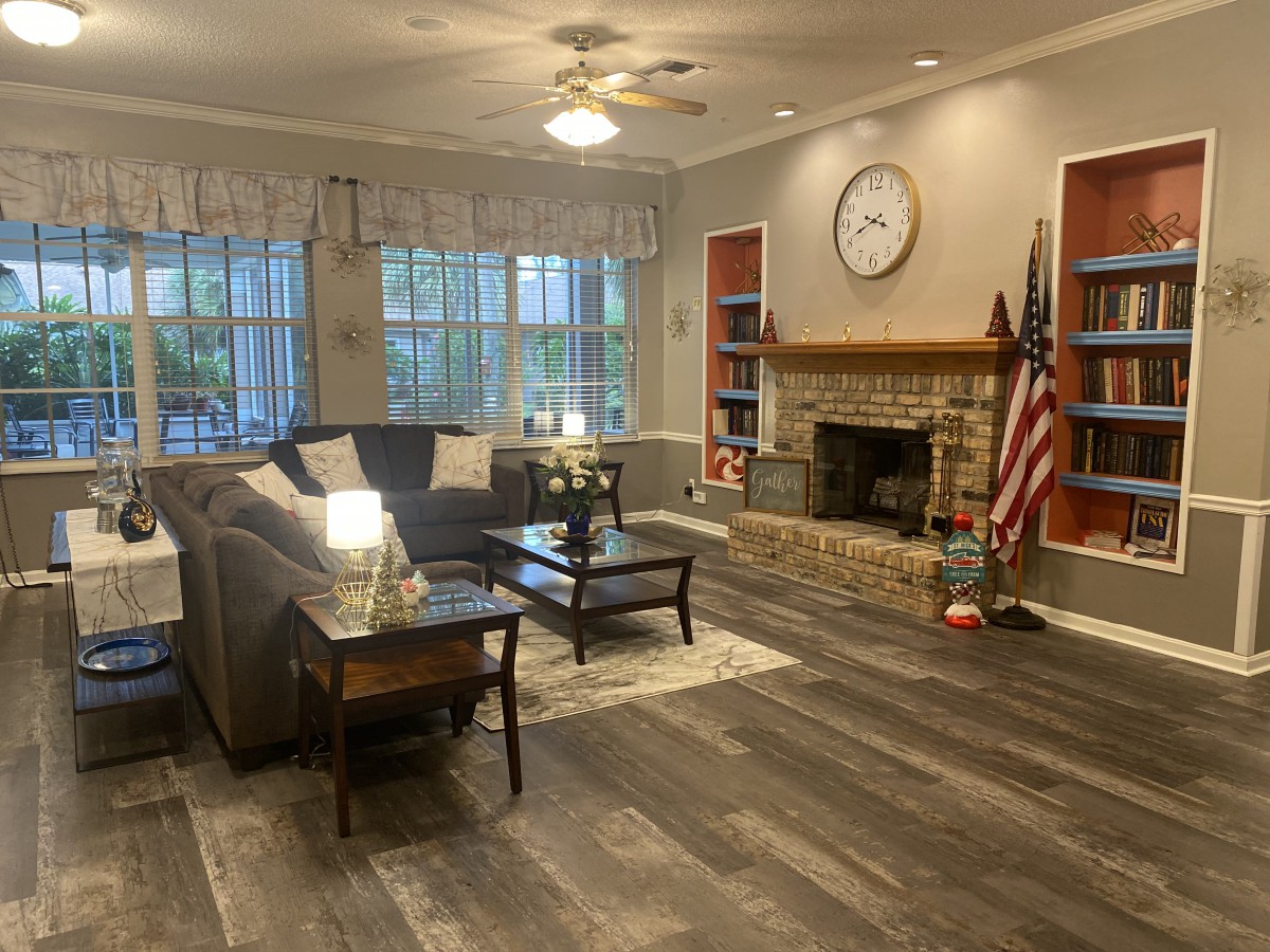 Cozy living room with a fireplace and modern decor.