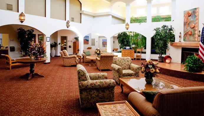 A bright and spacious lobby with comfortable seating and elegant decor.