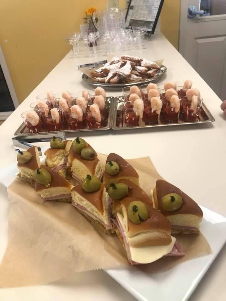 A selection of pastries and sweets displayed on a countertop.