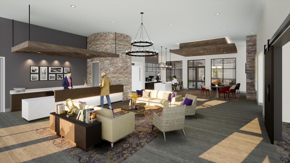 A modern lobby with stylish seating and a reception desk.