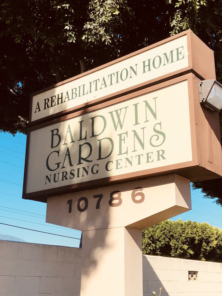A sign for Baldwin Gardens Nursing Center, a rehabilitation home.