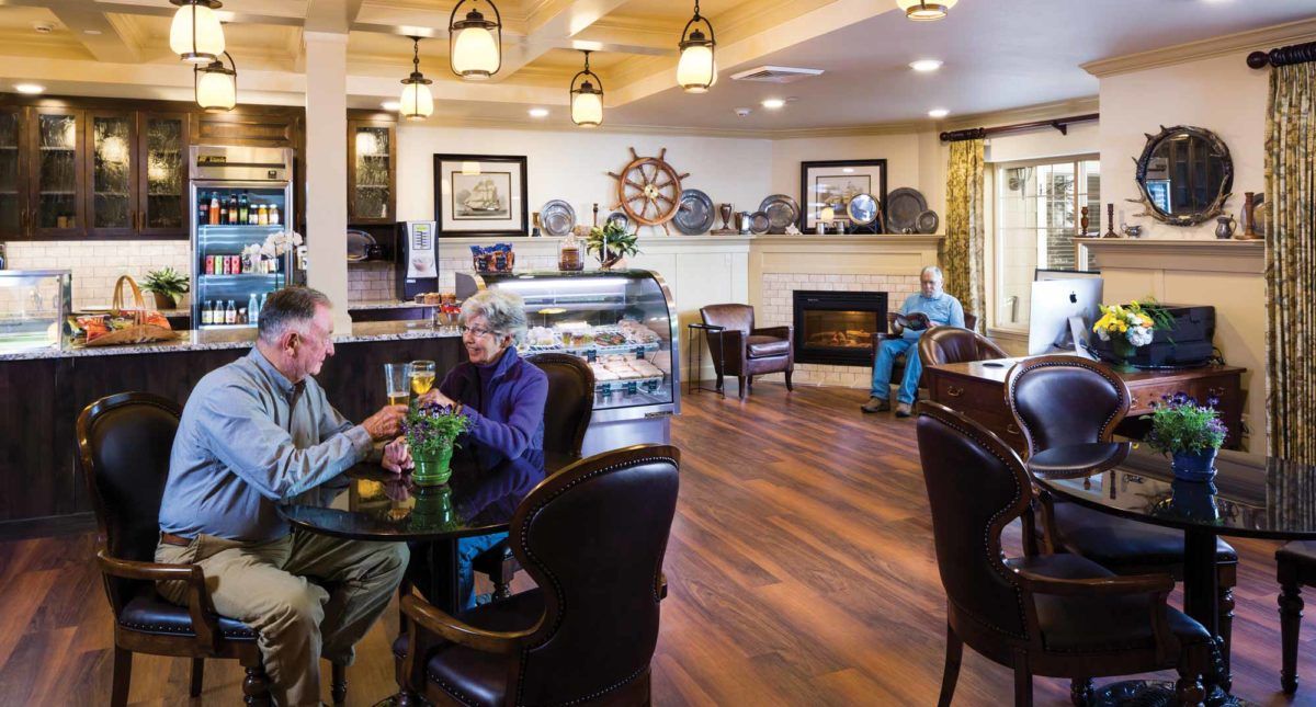 A cozy cafe setting with elderly people socializing and relaxing.