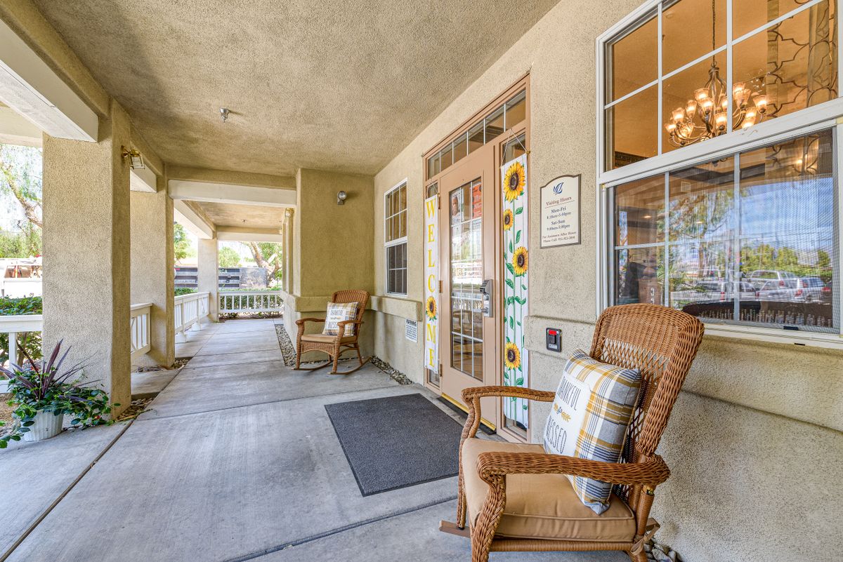 A welcoming porch with comfortable seating and charming decor.