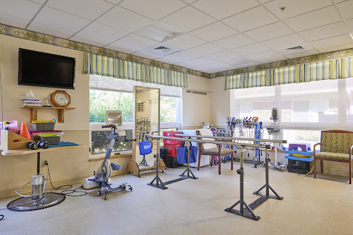 A well-equipped physical therapy room ready for rehabilitation activities.