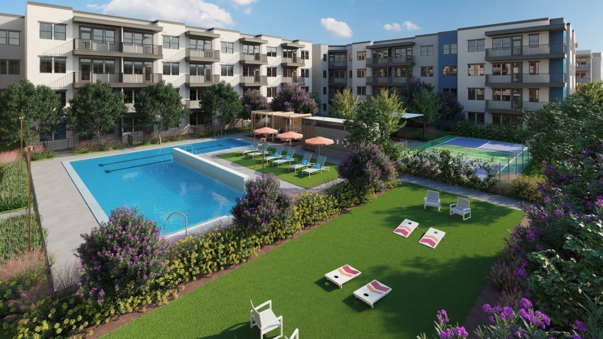 A modern apartment complex featuring a landscaped outdoor area with swimming pools and lawn chairs for relaxation.
