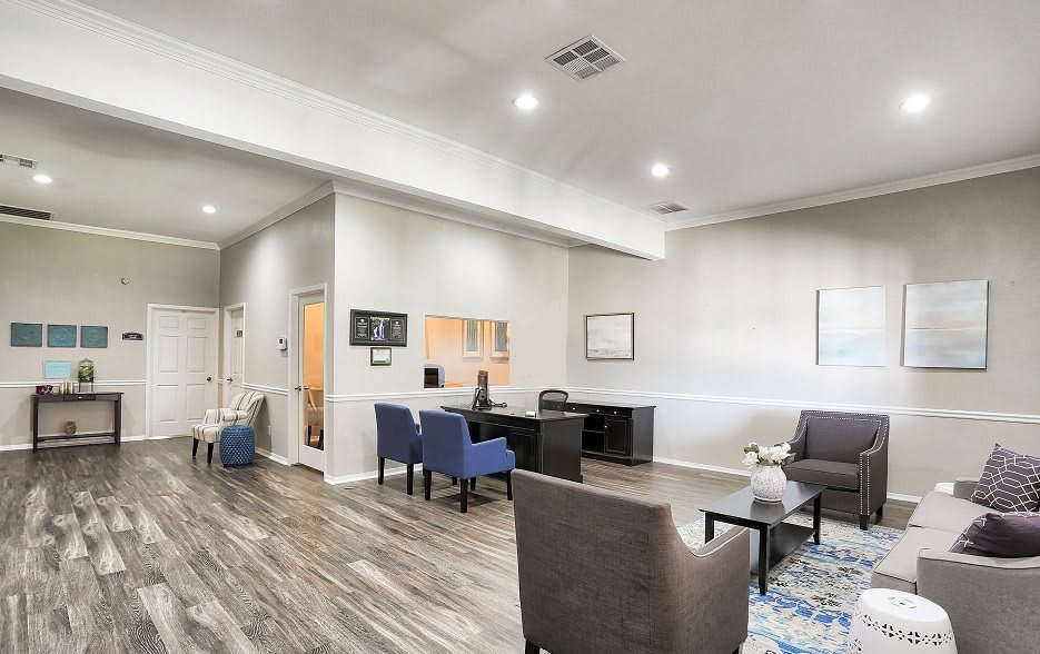 A modern office lobby with comfortable seating and stylish decor.