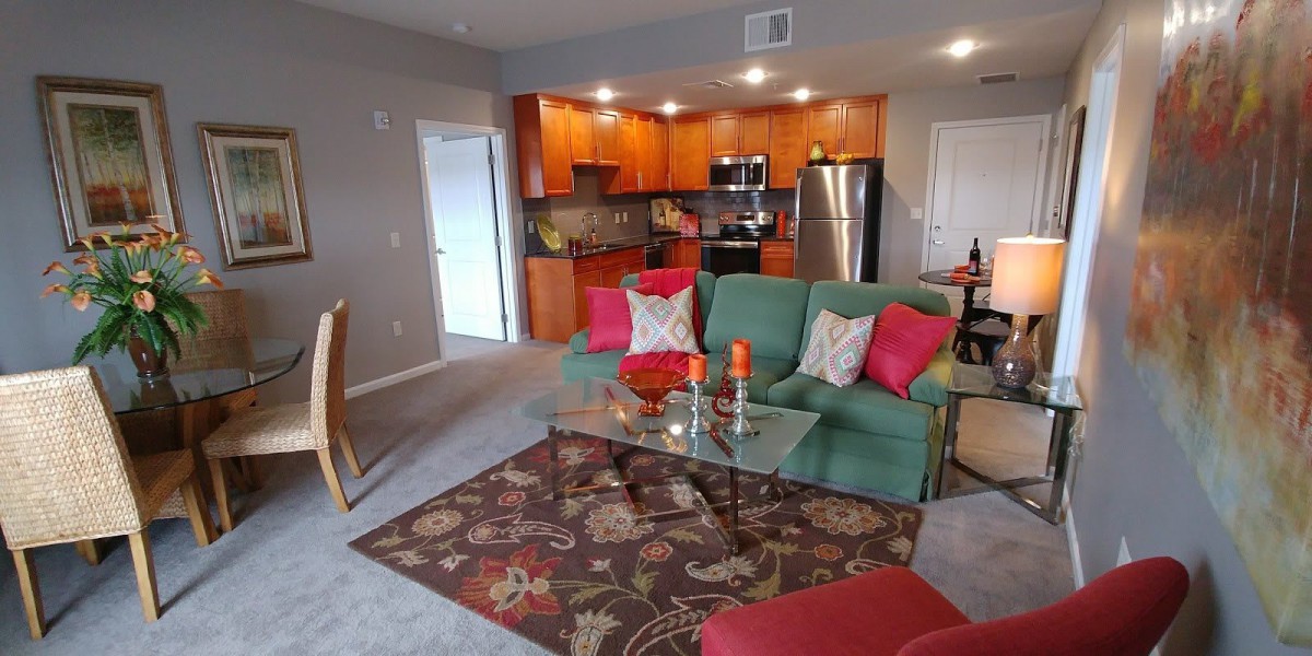 A modern apartment living room and kitchen with colorful decor.