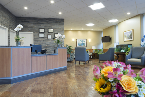 A welcoming reception area featuring modern decor and comfortable seating.