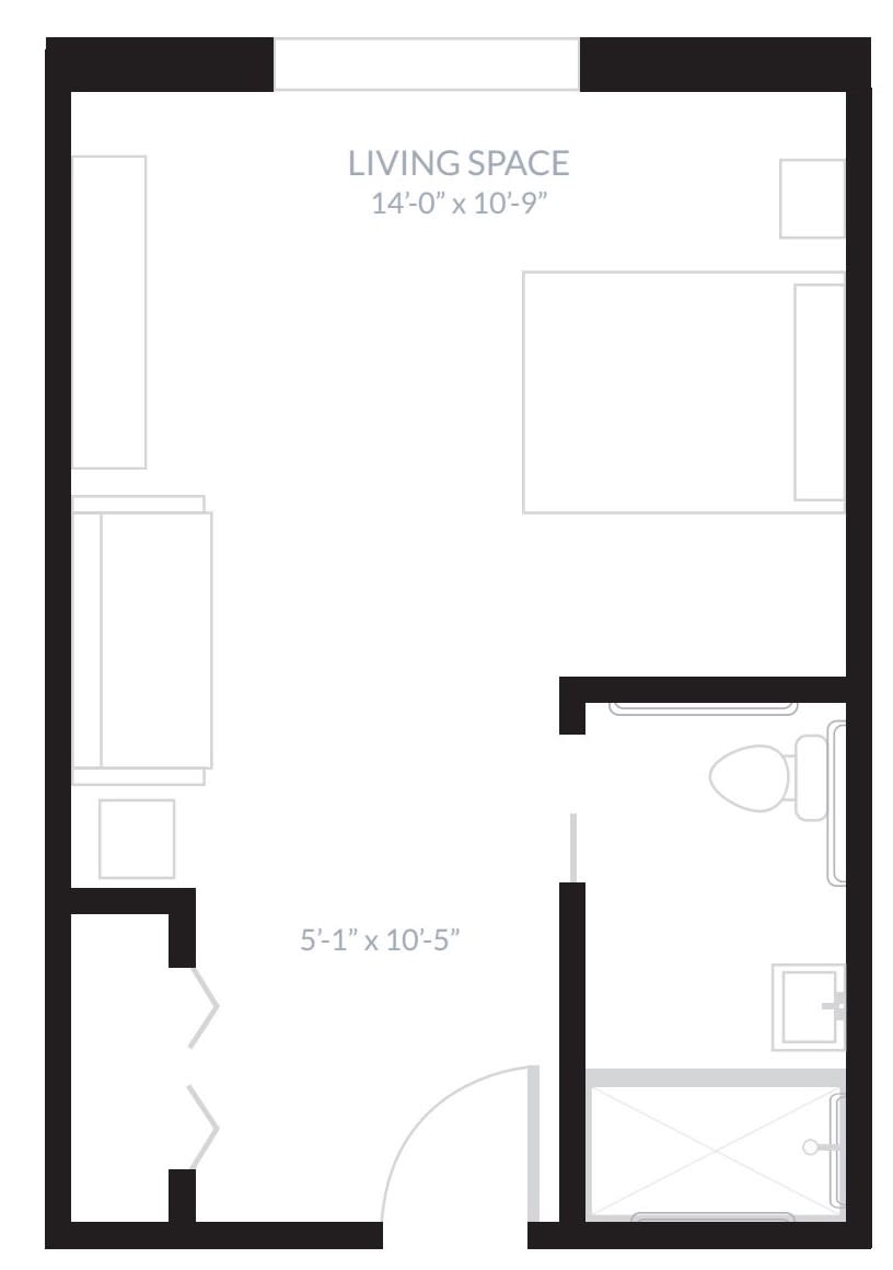 A simple floor plan of a small studio apartment, featuring a main living area and a bathroom.