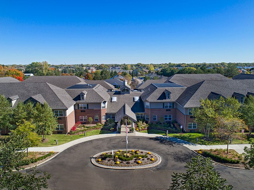 Aerial view of a residential apartment complex in a suburban setting.