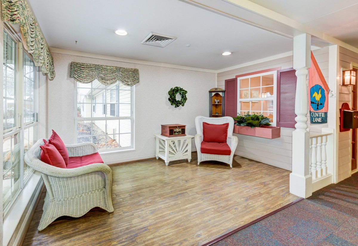 A cozy living room with traditional furniture and decor.