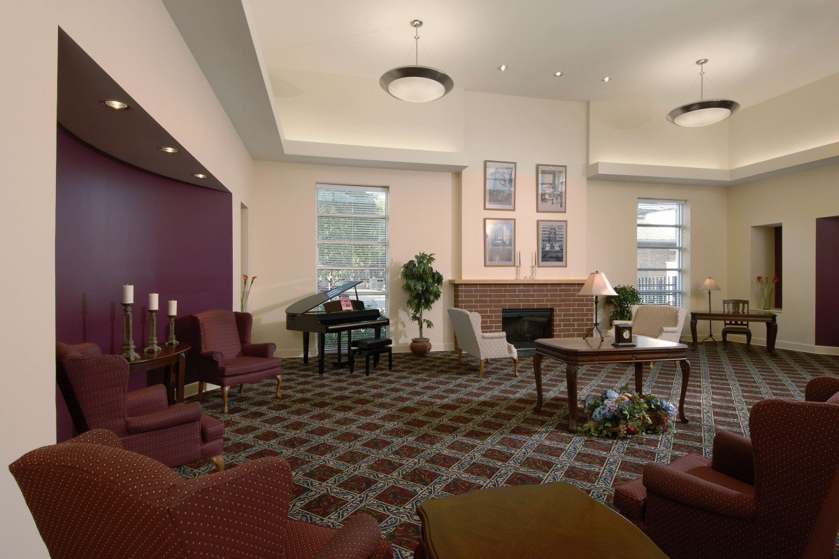 A spacious hotel lobby with comfortable seating and elegant decor.