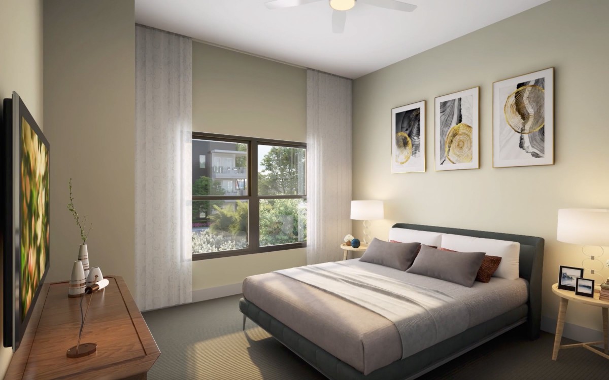 A modern bedroom interior with stylish decor and a large window.
