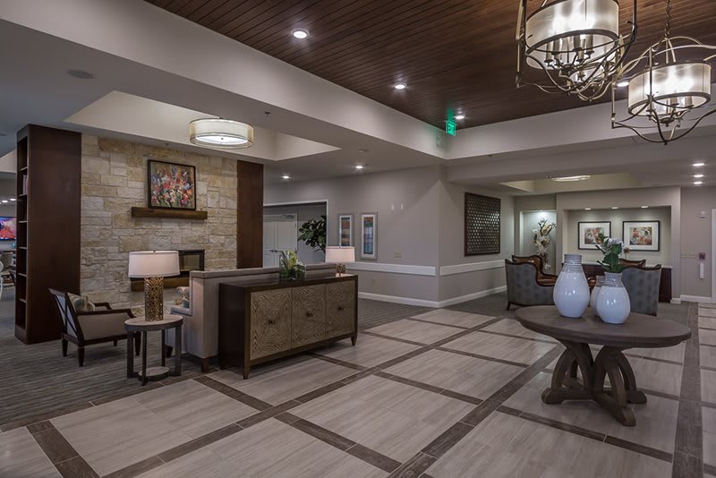A modern and elegantly designed lobby area with comfortable seating, stylish lighting, and tasteful decor.