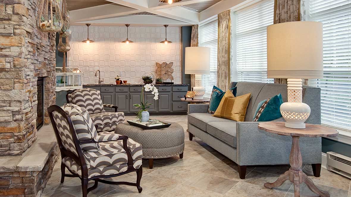 A cozy and well-designed living room with comfortable seating and elegant decor.