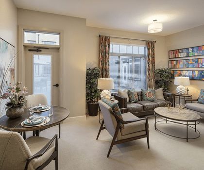 A stylish and modern living room with comfortable seating and elegant decor.