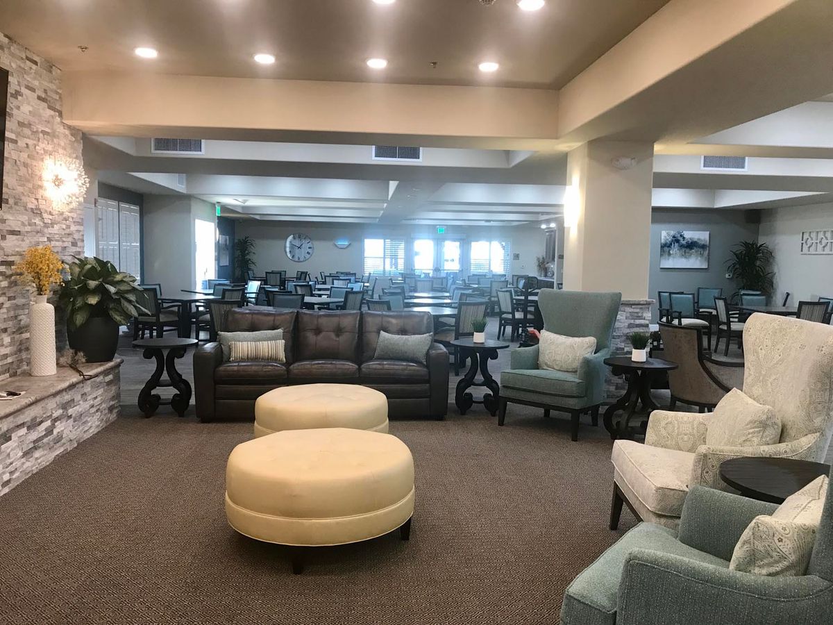 Spacious lobby area with comfortable seating and soft lighting.