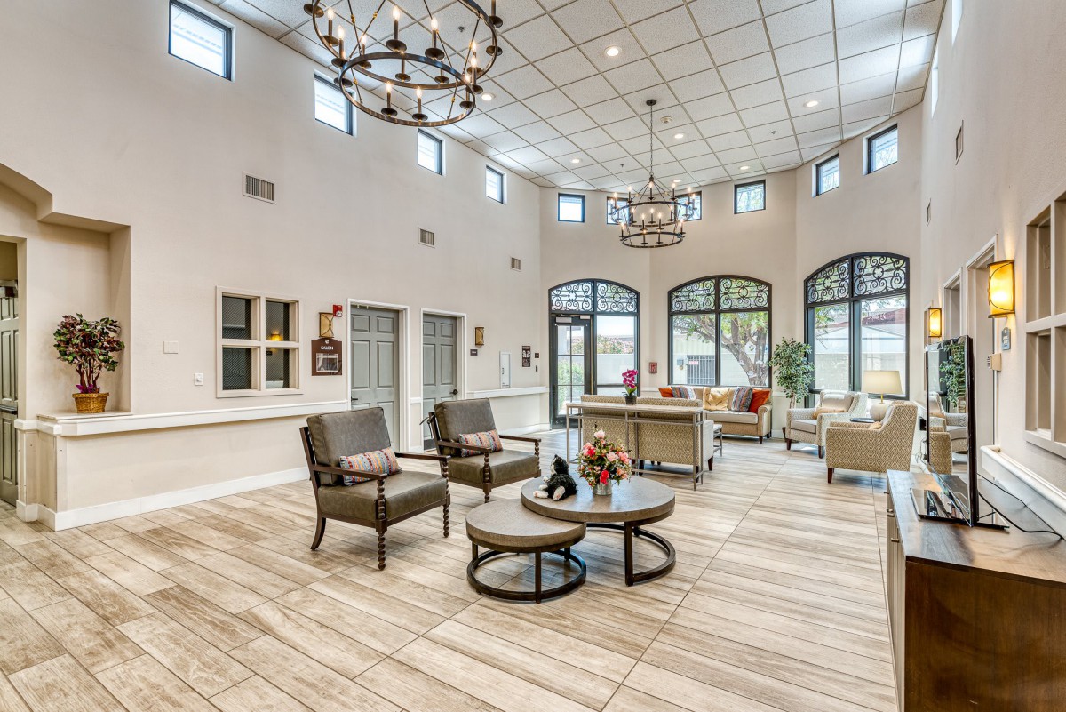 Spacious lobby with modern seating and large windows allowing natural light.