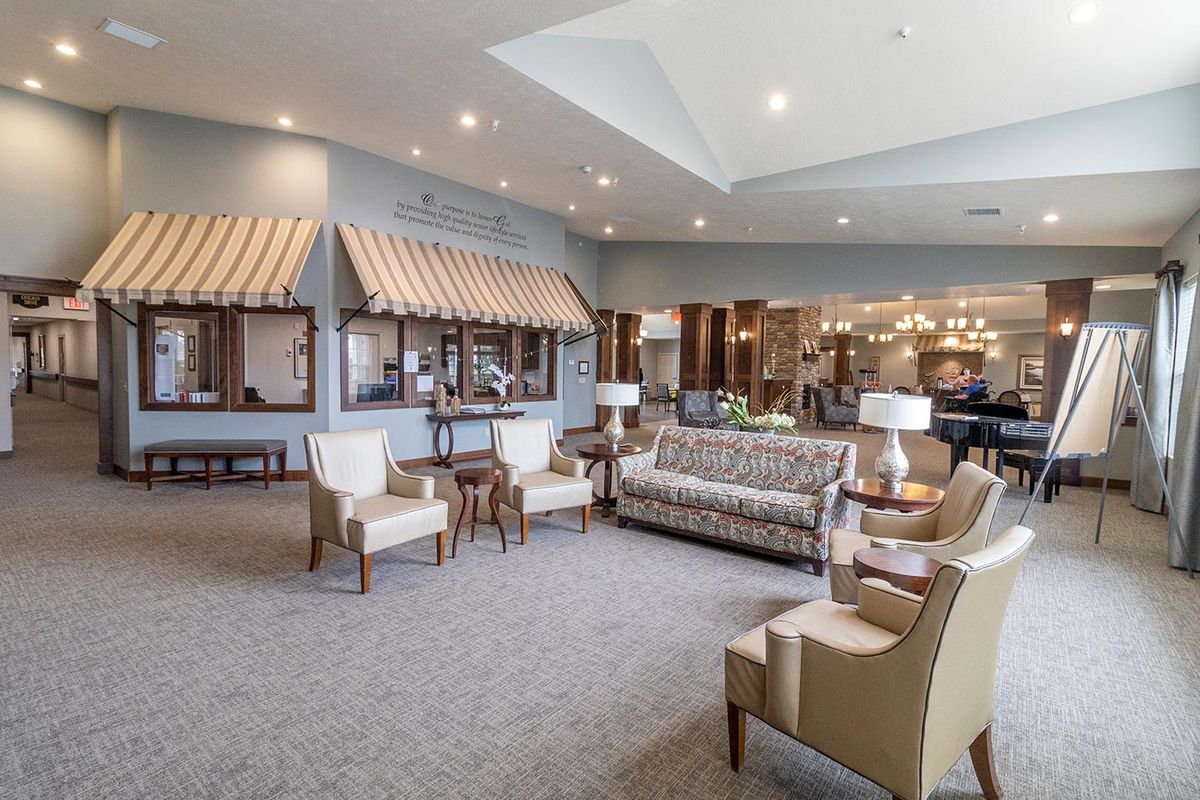 A spacious lobby with comfortable seating and modern interior design.