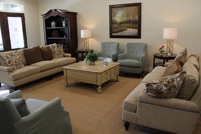 Cozy living room with comfortable seating and elegant decor.