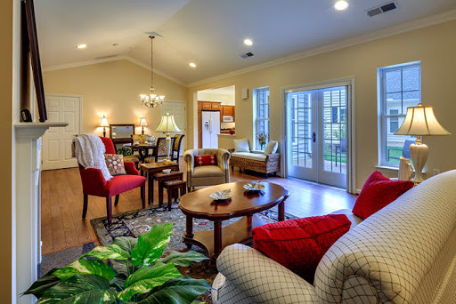 A bright and cozy living room featuring modern furniture and warm tones, perfect for relaxation and social gatherings.