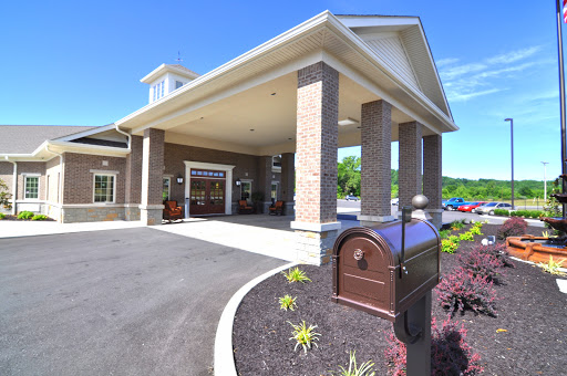 Main entrance of a modern hotel showcasing its architectural design.