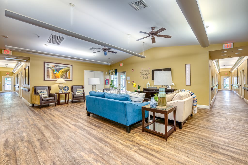 Spacious living room with modern furnishings and vibrant decor.