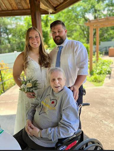 A beautiful moment captured at a wedding, celebrating love and family.