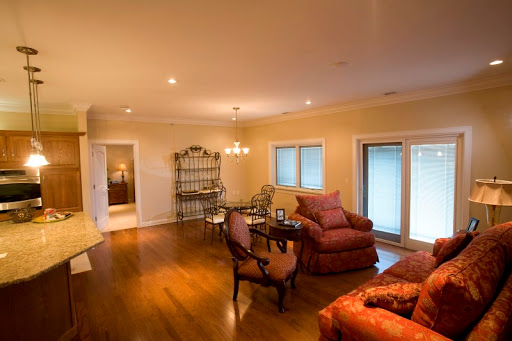 A cozy and inviting living room featuring elegant furniture and warm lighting.