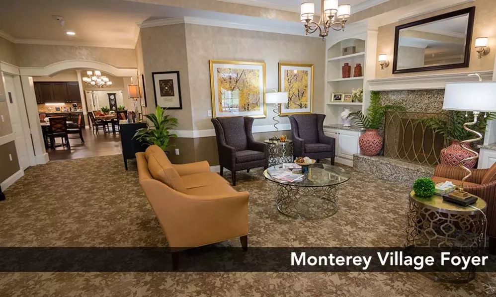A cozy and modern living room with stylish furniture and artwork.