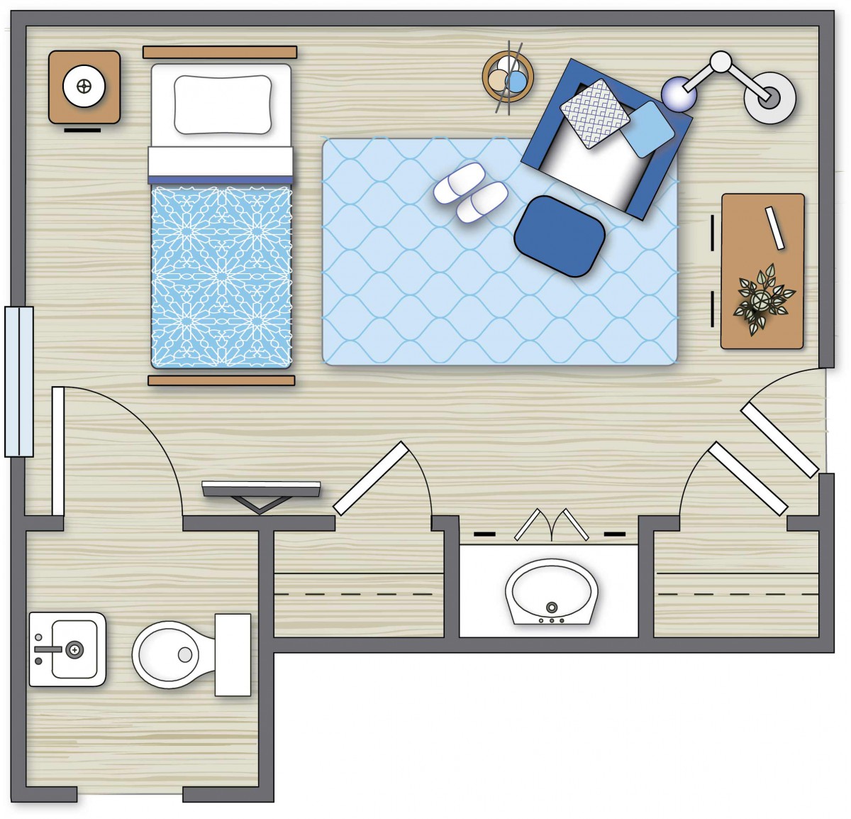 A floor plan featuring a bedroom with adjacent bathroom and furnishing details.