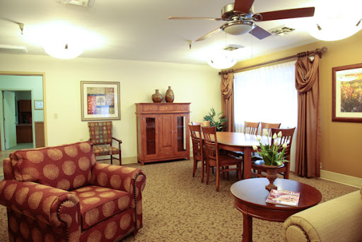 A cozy and well-furnished living space featuring a dining area, comfortable seating, and tasteful decor.