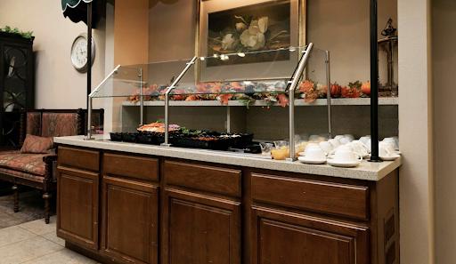 A well-organized buffet with various food options displayed on the counter.
