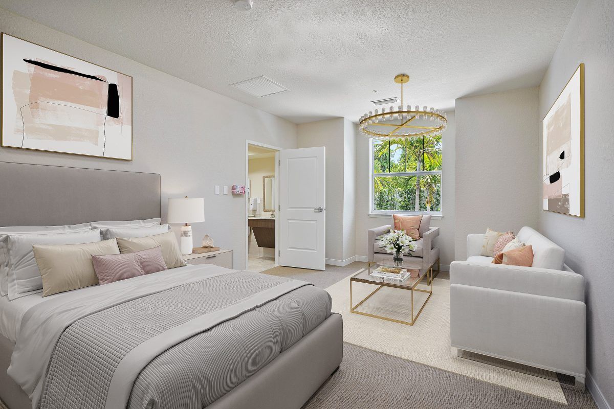 A modern and cozy bedroom featuring neutral colors and elegant decor.