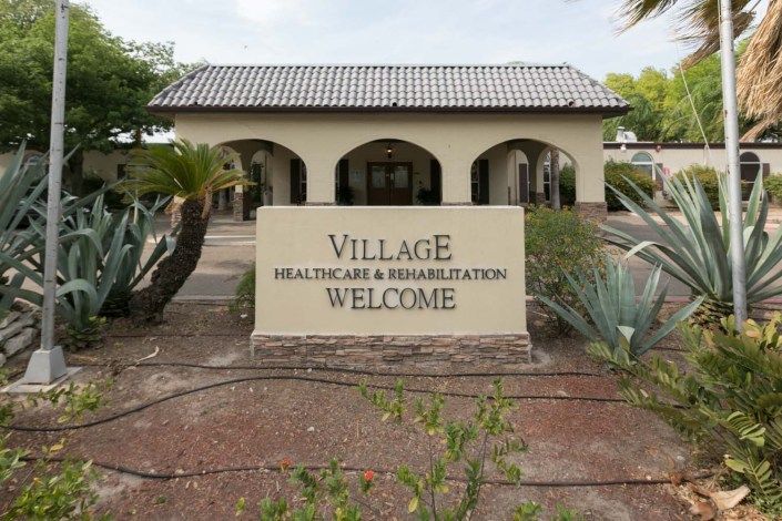 Entrance to the Village Healthcare and Rehabilitation facility.