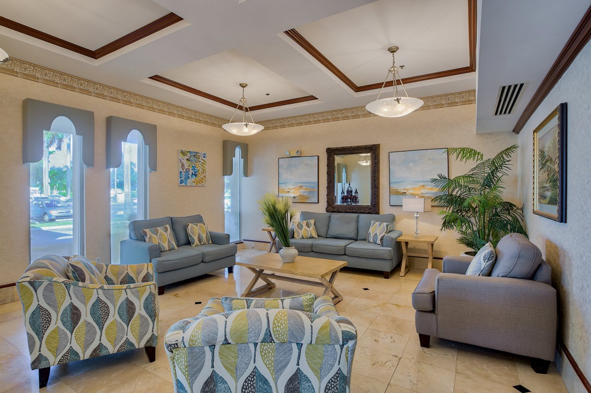 A modern living room with comfortable seating and stylish decor.
