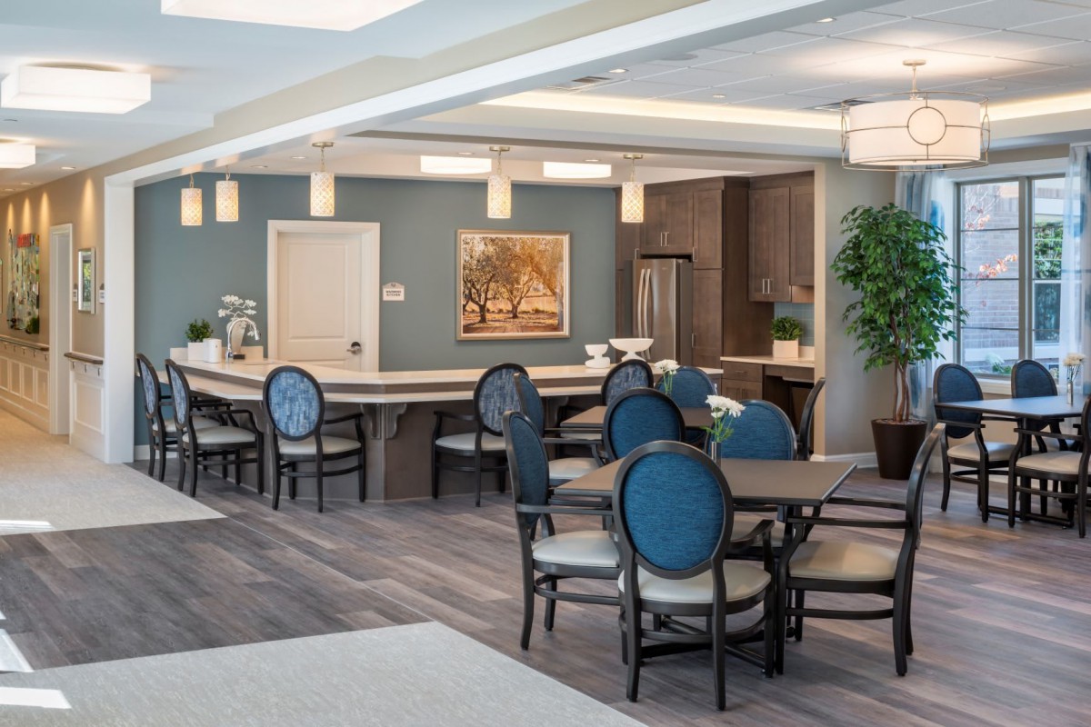 A modern dining area with elegant seating and ambient lighting.