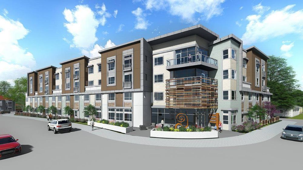 A modern apartment building with a contemporary design and multiple floors.