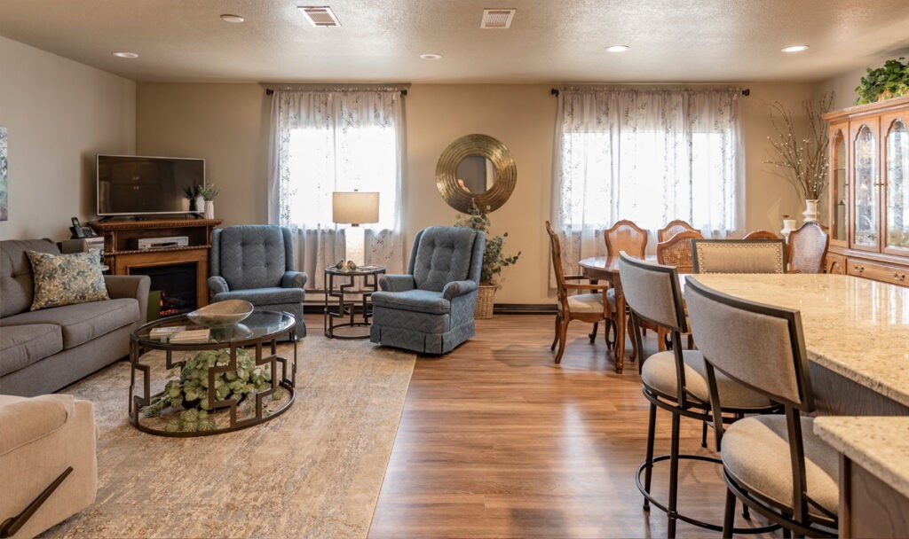 A cozy living room with comfortable seating and elegant decor.