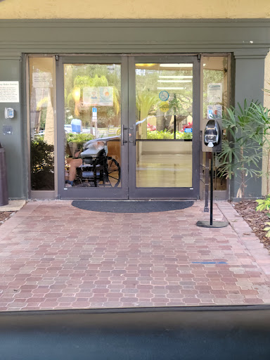Main entrance with accessibility features and a welcoming pathway.
