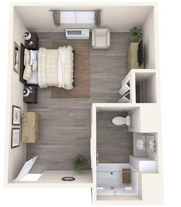 A compact studio apartment layout with a bedroom and bathroom.