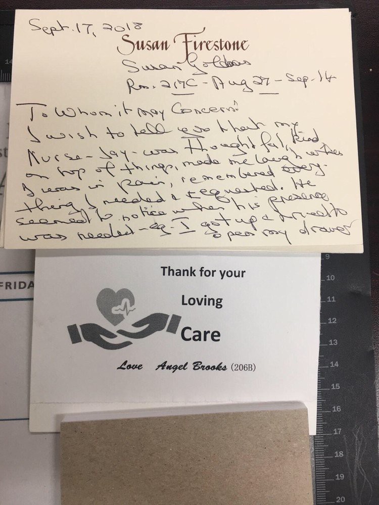 A handwritten thank you note and card expressing gratitude for caregiving.